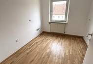 Erstbezug nach Sanierung: helle 4-Zimmer-Wohnung im obersten Stockwerk mit moderner Atmosphäre, kurzen Wegen und hervorragender Infrastruktur in Steyr-Münichholz!