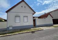 Einfamilienhaus mit ebenerdigem Garten und Nebengebäude - beleben Sie es zu neuem Leben!