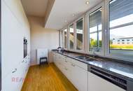 Einzigartige Dachgeschosswohnung mit atemberaubender Terrasse