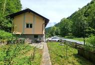 Attraktives Immobilienangebot in Bad Eisenkappel: Zwei sanierungsbedürftige Häuser mit Garten, Garagen und viel Potenzial