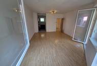 Barrierefreie Zweizimmerwohnung mit Eigengarten und Tiefgaragenstellplatz!