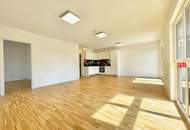 Sonniges 3 Zimmer Neubau-Eigentum Bj 2022 mit Terrasse, Tiefgaragenplatz & Grünblick in schöner Ruhelage