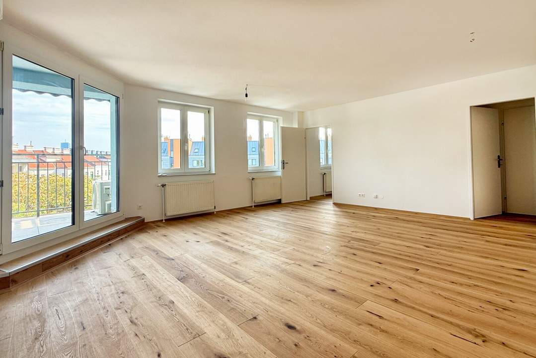 Tolle Raumaufteilung und keine Schrägen: 4 Zimmer DG-Wohnung mit Terrasse
