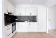 Provisionsfreier Erstbezug! Dreizimmerwohnung mit Balkon und Garagenplatz