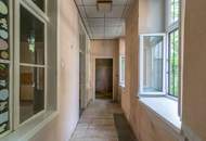 Renovierungsbedürftige Wohnung mit Charakter und Eigengarten!