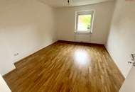 Ein Zuhause zum Verlieben: 4-Zimmer-Wohnung mit sonnigem Grünblick, lichtdurchfluteten Räumen, hochwertig saniertem Badezimmer, großzügiger Küche & viel Platz für Familien!