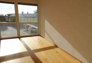 Neubauwohnung in Zentrumslage mit großer Balkon-Loggia und Carport