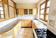 Zweifamilienhaus mit großem Grundstück und Entwicklungspotenzial in Ruhelage