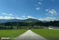 Sonniges Baugrundstück in Hanglage