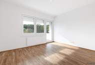 ERSTBEZUG nach Sanierung mit Blick auf Schloss Laudon | ca. 16 m² Loggia | Garagenplatz | Vollausgestattete Küche | Erholungsgebiet angrenzend