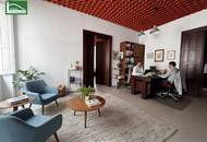 Arbeiten mit Atmosphäre: Altbaujuwel mit Mid-Century-Flair