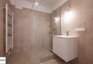 Wohnen im Bel Atrium: Zwei Zimmer Neubau Wohnung mit Balkon, inkl. Stellplatz und vielen Extras