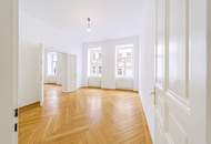 4-Zimmer-Altbauwohnung mit Balkon und Fischgrätparkett in ruhiger Innenhoflage