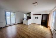 3-Zimmer-Neubauwohnung mit Westbalkon & Garage in ruhiger Grünlage