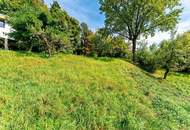 Sonniges Hanggrundstück mit Südausrichtung und Ausblick auf Berge und See