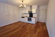 Schöne 2-Zimmer-Gartenwohnung mit Terrasse und TG-Parkplatz