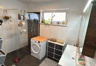 Klimatisierte Neubau-Anlegerwohnung mit 3 Zimmern, 90 m² Garten und 2 Parkplätzen in moderner Siedlung in Wasendorf