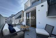 BEIM DONAUUFER: Erstbezug: Klimatisierte Dachgeschosswohnung mit ruhigem Hofbalkon