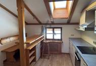 Miete: Dachgeschosswohnung mit Terrasse und Parkplätzen in Aurach