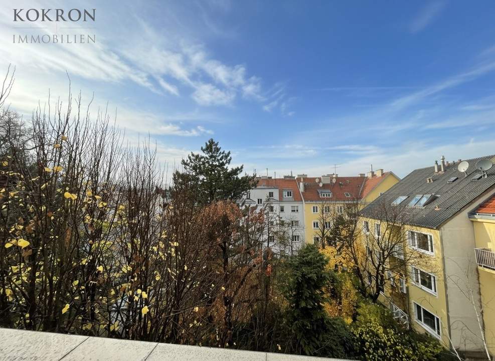 Dachgeschosswohnung in idealer Lage: 2 Zimmer, 2 Terrassen und große Garage erwarten Sie!