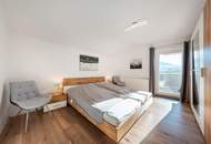 Zwei Wohneinheiten, ein Ausblick – Zweifamilienhaus mit Bergpanorama