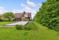 WILHERING: Perfekt aufgeteiltes Wohnhaus mit XL- Garage, Pool auf einem hervorragenden Grundstück mit ca. 1.069m²