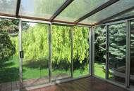 7-Zimmer Familienhaus mit Wintergarten und idyllischem Garten !