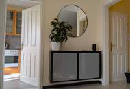 Traumhafte 2-Zimmer-Wohnung mit Penthouse-Flair und Weitblick durch den Wintergarten