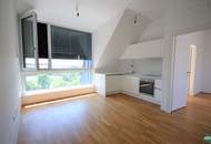 Exklusive 2‑Zimmer‑DG‑Wohnung mit sonniger Hofterrasse und Weitblick über Wien