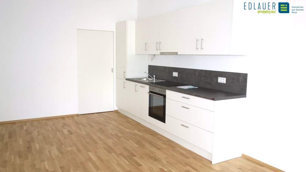 Moderne Mietwohnung in Top Lage - mit Eigengarten!