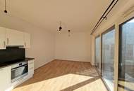 Schicke Neubauwohnung mit kl. Garten in idyllischer Ruhelage