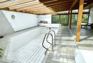 Zentral gelegenes Ein- bis Zweifamilienhaus mit großem Garten und Doppelgarage!