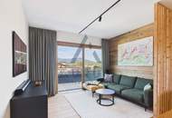 Penthouse mit Dachterrasse &amp; Whirlpool in zentraler und pistennaher Lage mit Kaiser- &amp; Hornblick