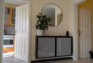 Traumhafte 2-Zimmer-Wohnung mit Penthouse-Flair und Weitblick durch den Wintergarten