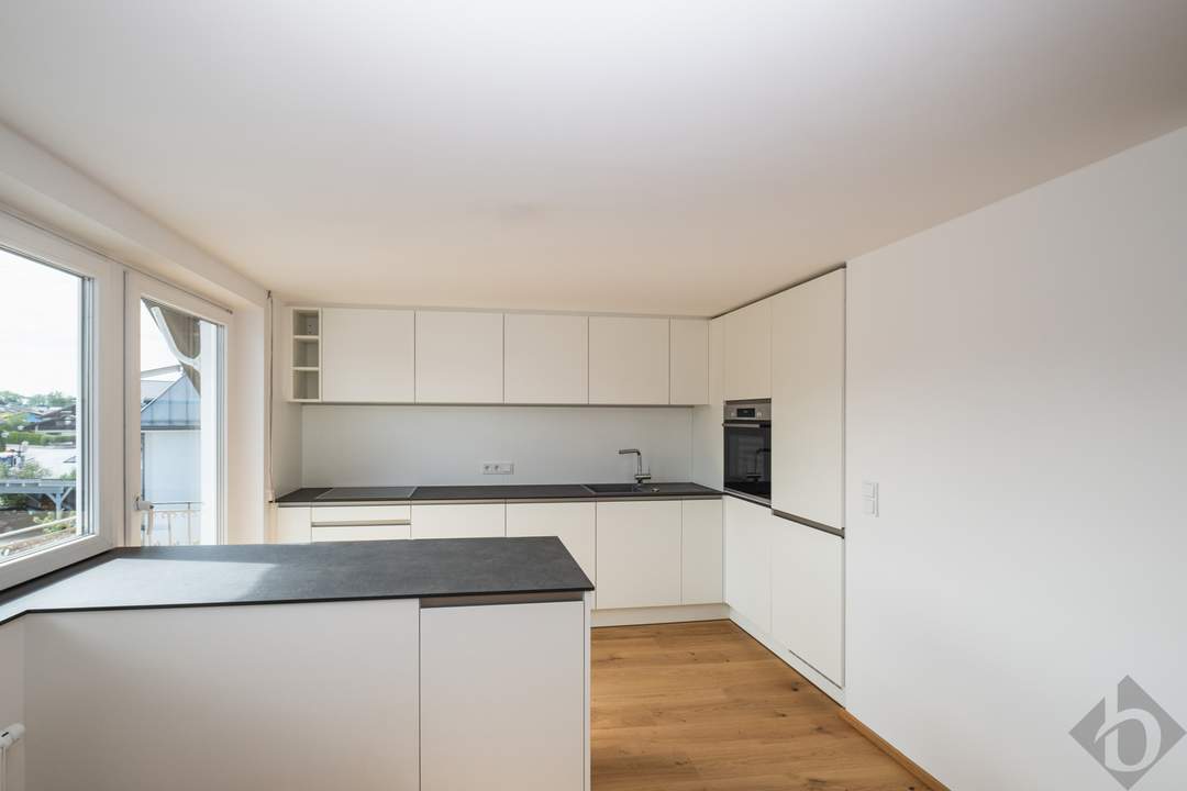 Geräumige Dachgeschoßwohnung mit Garten direkt am Mühlbach