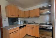 Sanierungsbedürftiger Bungalow mit großem Grundstück - in ruhiger, sonniger Lage