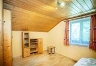 Viel Platz zum Leben – Zweifamilienhaus mit Werkstatt, Party-/ Hobbyraum & zwei Garagen in ruhiger Lage bei St. Wolfgang