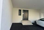 Neu gebaute Doppelhaushälfte mit großem 3fachcarport in beliebter Siedlung