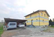 Einfamilienhaus mit großem Garten und Schwimmteich