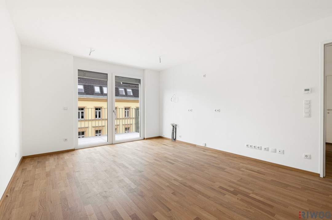 JETZT PROVISIONSFREI | ERSTBEZUG mit ca. 7 m² BALKON | 2-Zimmer Neubau | Fernwärme | TG-Stellplatz optional | Nachhaltiges Wohnbauprojekt