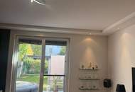 Top ausgestattetes GARTENAPARTMENT mit einer EXTRA TERRASSE und einem TIEFGARAGENPLATZ