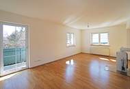 Reizende 3-Zimmer-Wohnung mit 2 Balkonen, gartenseitiger Veranda und Garagenplatz