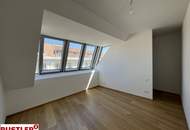 Erstbezugs-Dachgeschosswohnung in zentraler Lage