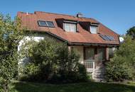 "Familienfreundliches Einfamilienhaus mit Wellnessbad, Sauna, Kachelofen, Fußbodenheizung, großem Garten und Doppelgarage in Tulln"