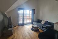 Charmante Dachgeschosswohnung mit Balkon – Ideal für Anleger!