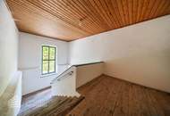Sanierungsbedürftiges Wohnhaus mit 24 Wohneinheiten in Hanglage