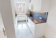 Elegante Dachgeschosswohnung mit Gartenblick, Terrassen und Garage