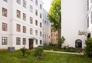 Das Stadtleben in Ruhe genießen: Stil-Altbauwohnung in lebendiger Lage an der Grenze 7./8. Bezirk