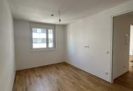 Traumhafte Terrassenwohnung in 1230 Wien – Erstbezug mit Balkon und Garage!