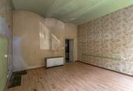 Renovierungsbedürftige Wohnung mit Charakter und Eigengarten!